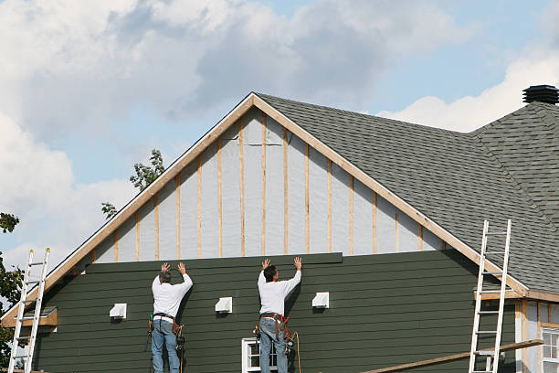 Professional Vinyl Siding technician working in Fredericksburg, PA